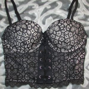 Victoria’s Secret, 32C, black lace corset bra with zipper.